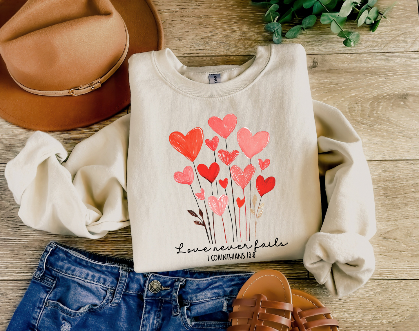 Love Never Fails Tee